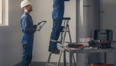 Olathe, KS plumber repairing a water heater for fast same-day home service